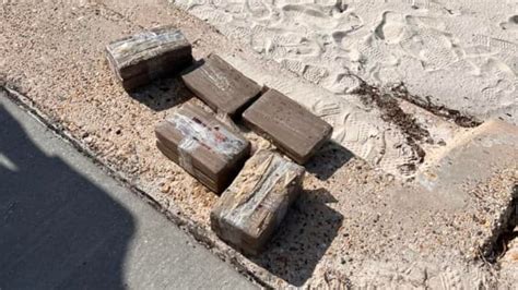 8 bricks of suspected cocaine found washed up on beach