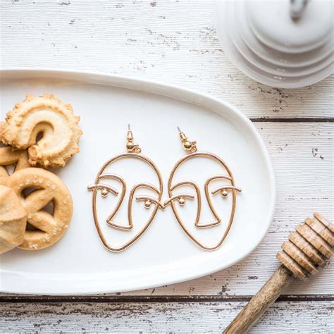 Abstract Face Gold Earrings – PRISHIE