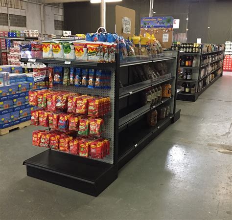 Textured Black Retail Shelving with Acrylic Front Lips Shelving ...