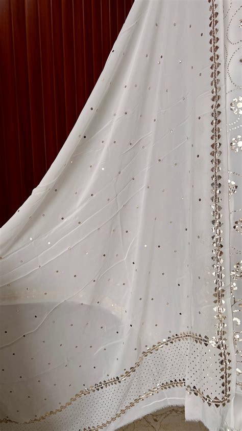 White heavy badla and mukaish work kurta and dupatta set