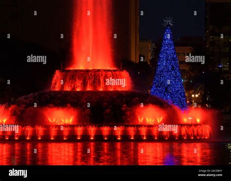 The Lake Eola Park Christmas tree lights change color with the colorful ...