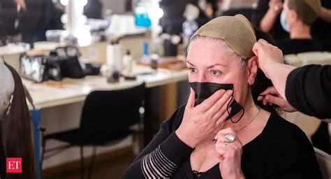 How the chorus of the Paris Opera projects through masks to keep COVID ...