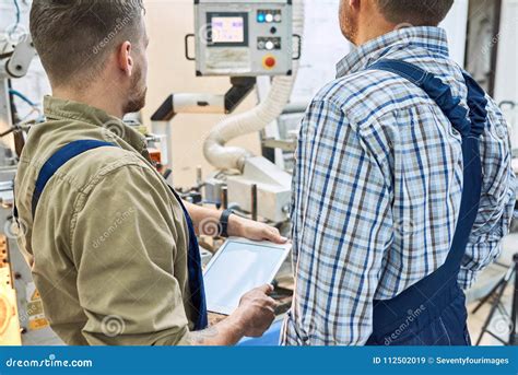 Image result for Workers Operating Machine