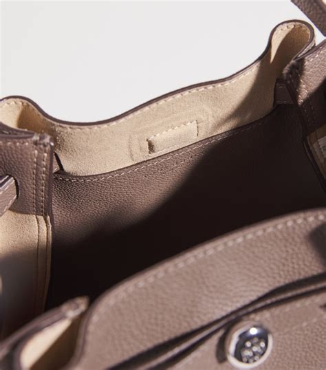 Tory Burch Beige Leather Romy Bucket Bag | Harrods IN