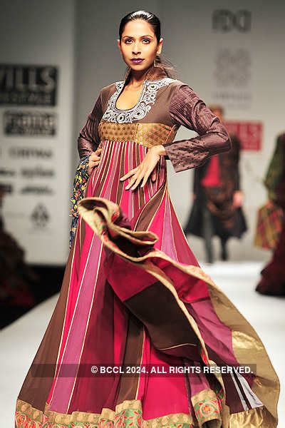A model showcases a creation by designers Ashish Viral and Vikrant on ...