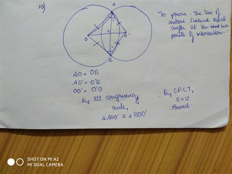 prove that the line of centres of two intersecting circles subtend ...