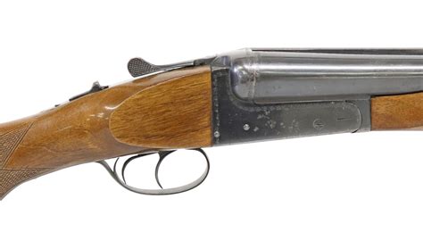 At Auction: SPANISH ZABALA 10 GAUGE SIDE BY SIDE SHOTGUN