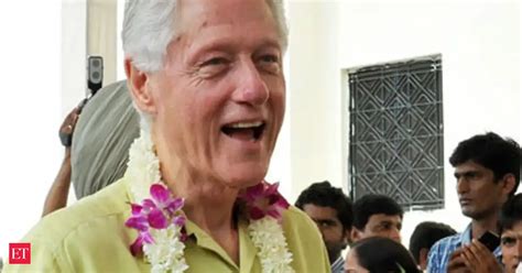 Bill Clinton visits school kitchen, serves chapattis to students - The ...