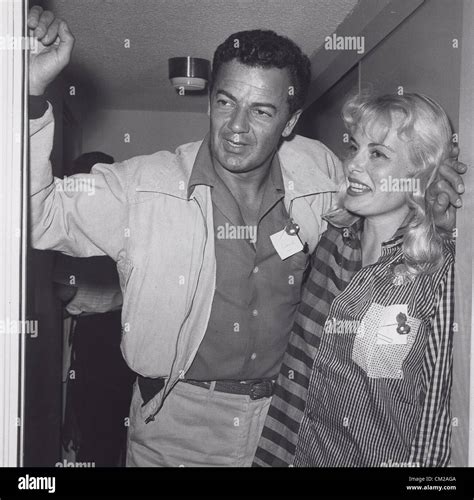 CORNEL WILDE with his wife Jean Wallace at Ho Ho Beans.Supplied by ...