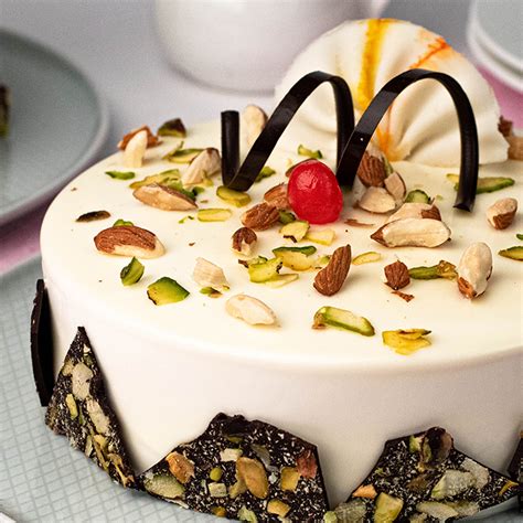 Deliciously Unique: Order Rabdi Pista Almond Cake Online Today