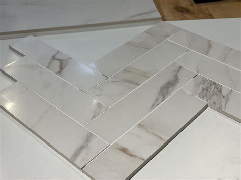 White Marble Herringbone Tiles