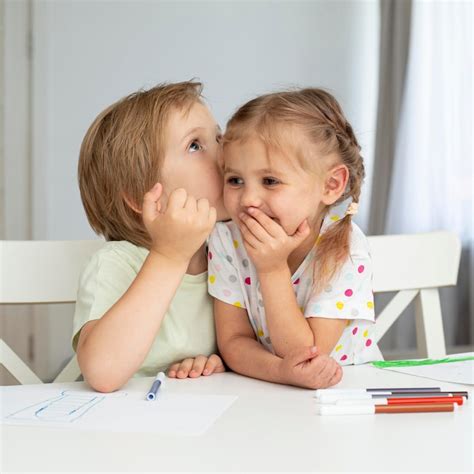 Kids whispering Images - Free Download on Freepik