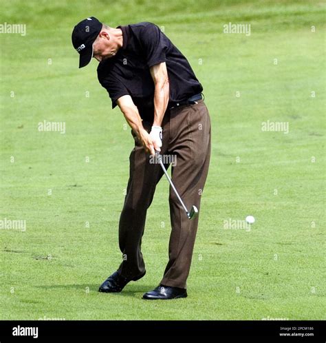 Rick Price hits his approach shot to the ninth green during third round ...
