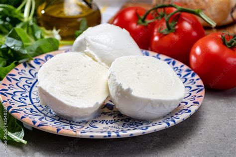 Fresh handmade soft Italian cheese from Campania, white balls of ...