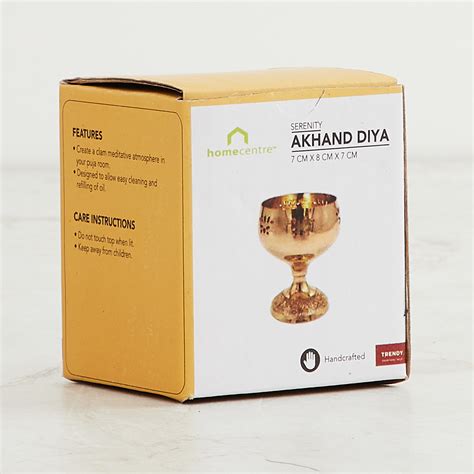 Buy Serenity Gold Metal Akhand Diya with Lotus Motif from Home Centre ...
