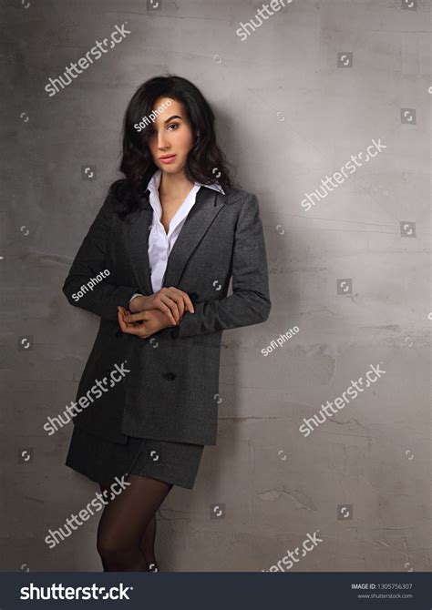 Woman in Grey Business Suit 的图像结果