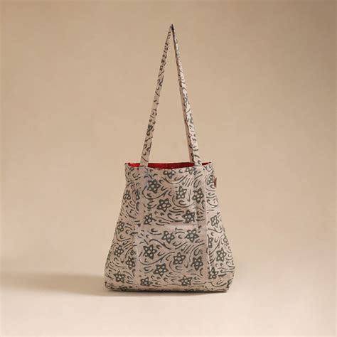 Beige Handcrafted Fabric Jhola Bag