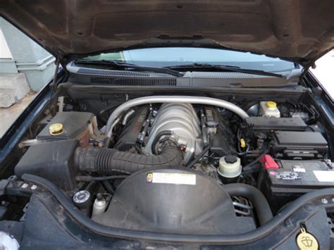 Rezultat imagine pentru 2012 Jeep GC SRT8 Powertrain Control Module Location