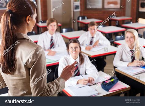 Female High School Teacher Teaching In Classroom Stock Photo 115841704 ...