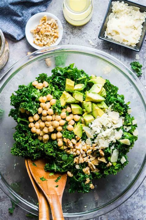 Fresh kale salad recipe made with avocado, chickpeas, Parmesan cheese ...