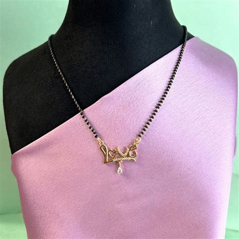 Love Golden American Diamond Mangalsutra