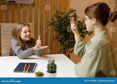 Conversation between Teacher and Student in Sign Language. Mute or Deaf ...