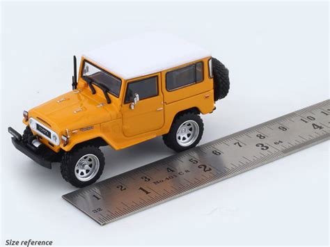 Toyota Land Cruiser FJ40 yellow with figure 1:64 TimeMicro diecast ...