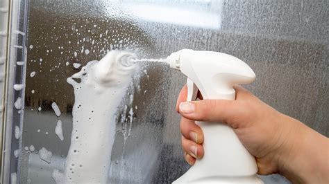 How to clean a glass shower door — get rid of limescale and watermarks ...