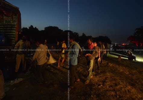 Buy Indian migrant laborers and homeless people gather on the banks of ...
