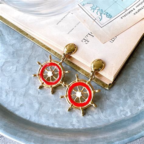 YA163-【 AVON 】エイボン・ヴィンテージイヤリング 1974 Gold Tone Red Enamel Paint Steering ...