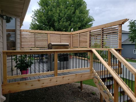 Beautiful Louvered Privacy Wall above Deck Railing on Raised Deck ...