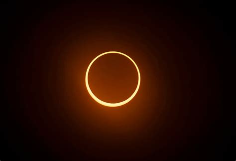 Annular solar eclipse brings cheers and shouts of joy as it moves ...