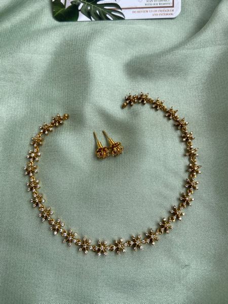 Diamond Look alike Floral Necklace with Earrings – Daivik.in