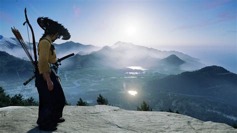 Player character Atsu looks down over a beautiful vista in Ghost of Yotei.