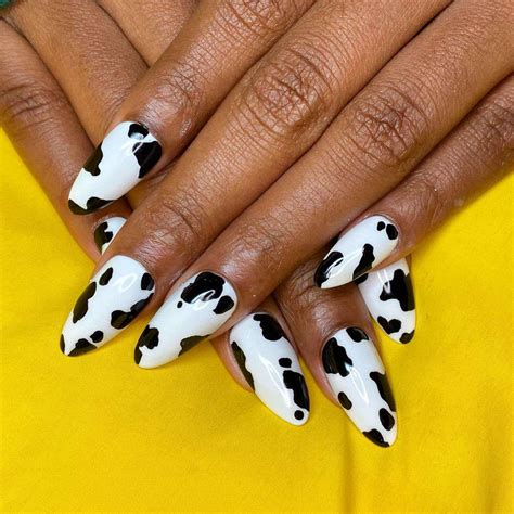 20 Cow Print Nail Designs for a Playful Take on a Neutral Manicure