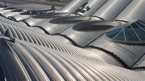 Walkway Provides Safe Access on Undulating Airport Terminal Roof - Kee ...