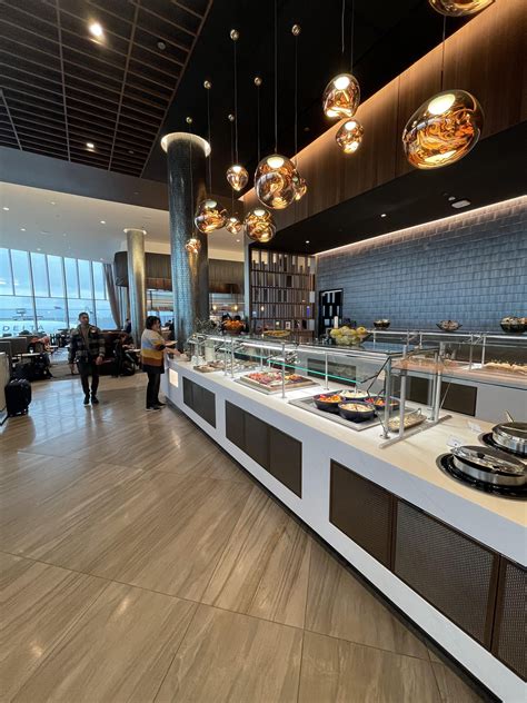 Love the new lounge at ORD, same aesthetic as LGA. Boarding from the ...