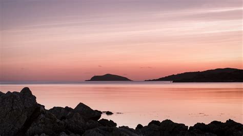 Download wallpaper 1920x1080 sea, coast, rocks, landscape, pink full hd ...