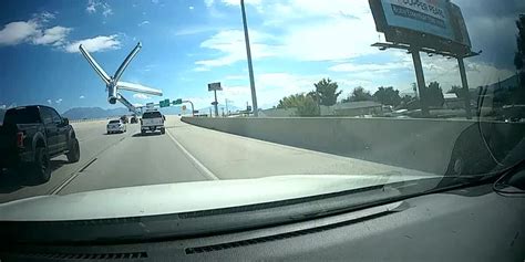 Flying chair base smashes into car’s windshield on interstate