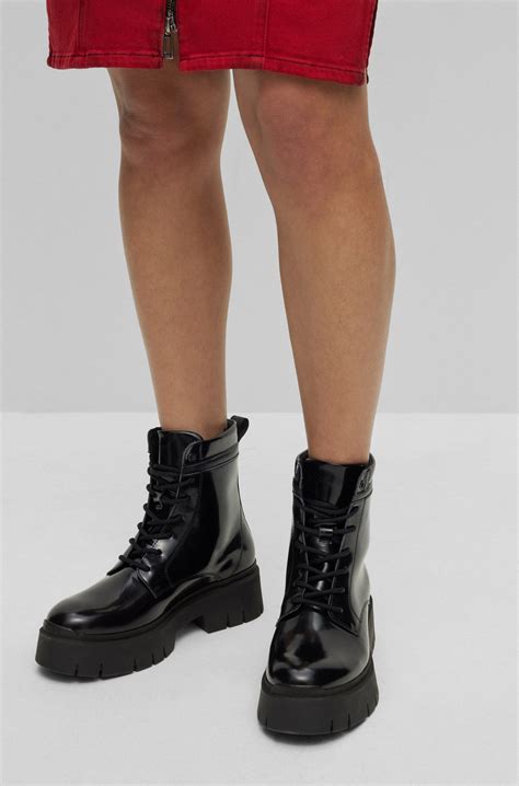 HUGO - Lace-up leather boots with branded collar trim