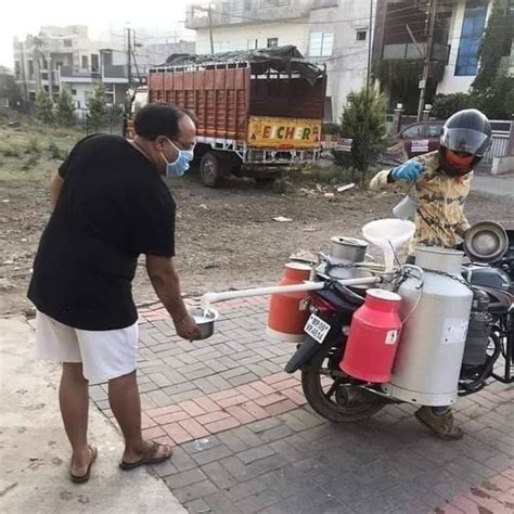 Madhya Pradesh milkman's new 'socially distancing' milk delivery system ...