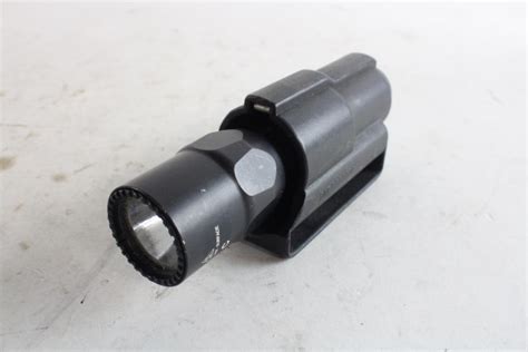 Image result for SureFire LED Flashlight