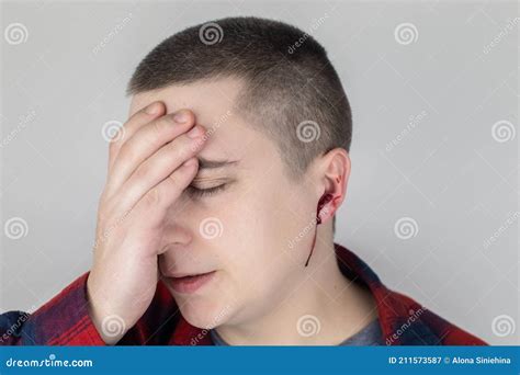 A Man Whose Ear is Bleeding. Vascular Rupture, Damage To the Tympanic Membrane, Ear Diseases ...