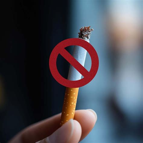 Hand holding cigarette with no smoking sign | Premium AI-generated image