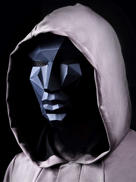 Download Squid Game Mask Man Picture | Wallpapers.com