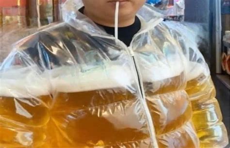 Forget beer goggles, Ipswich footy fans prefer the beer puffa jacket ...