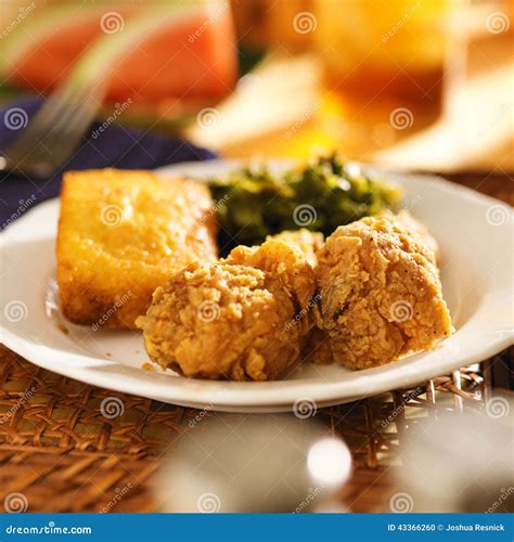 Soul Food - Fried Chicken With Collard Greens And Corn Bread Stock ...