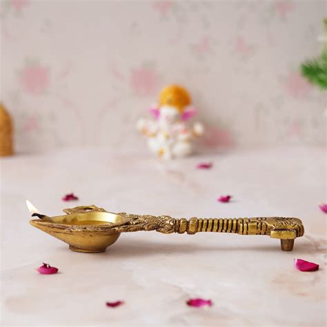 eCraftIndia Golden Handcrafted Ethnic Design Brass Diya with Handle