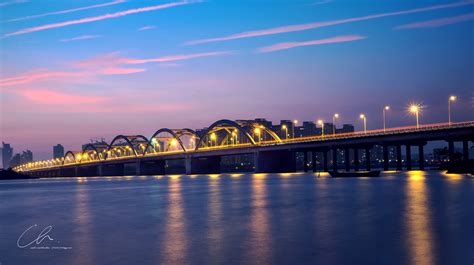 中国海南海口海甸河世纪大桥高视角晴天风光照片摄影图片_ID:427448372-Veer图库