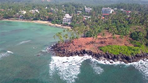 Aerial View drone 4k footage Of Coconut Tree Hill at Mirissa, Sri Lanka ...